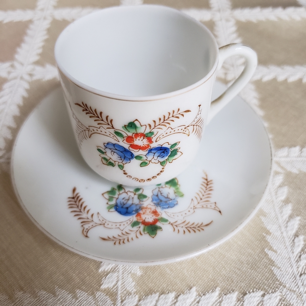Antique miniature cup and saucer.